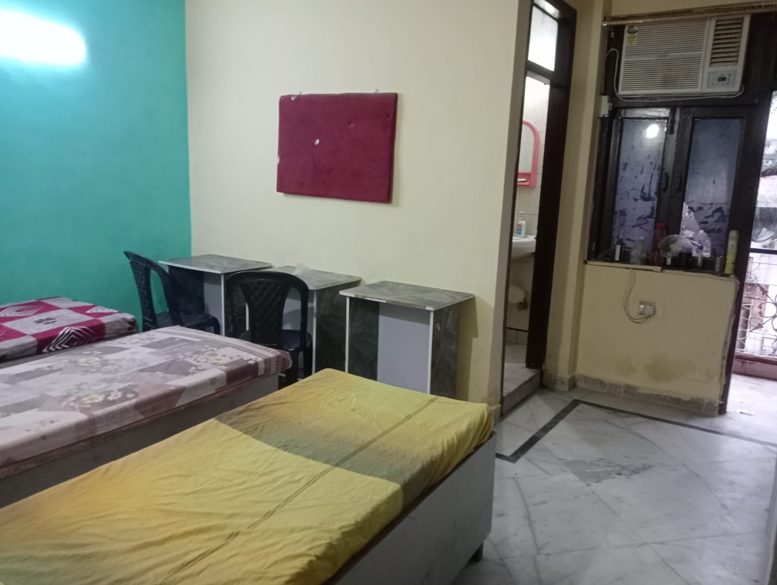 Clean accommodation room with study-friendly layout